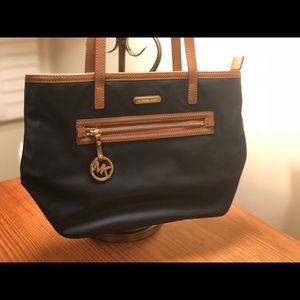 Michael Kors Purse with brown and gold accents